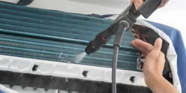 High-pressure jet wash for evaporator and condenser coils