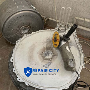 Whirlpool washing machine preparing a drum for replacing flanges